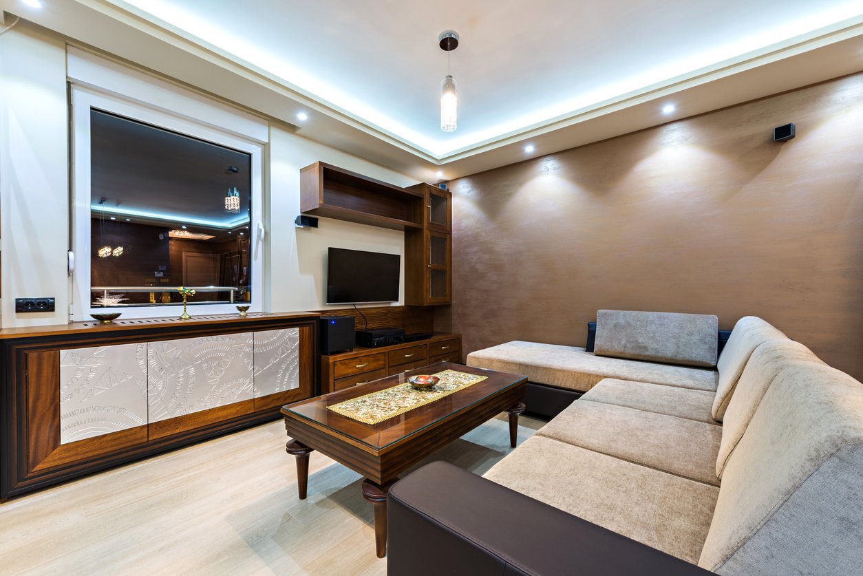 Interior of a luxurious living room in pastel shades